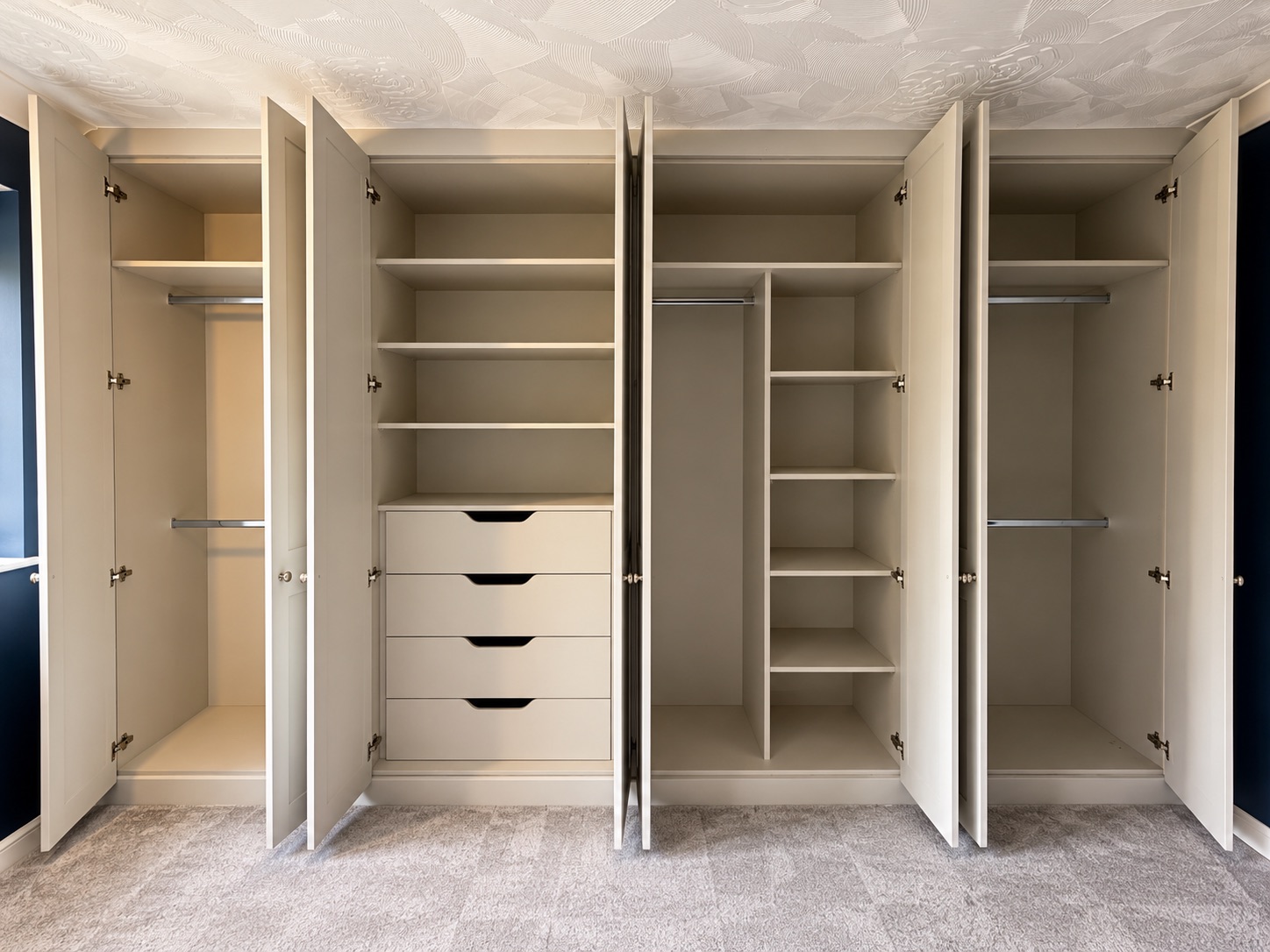 Second photograph of the light grey Rockingham shaker fitted wardrobes installed in Lower Green Wakes Colne