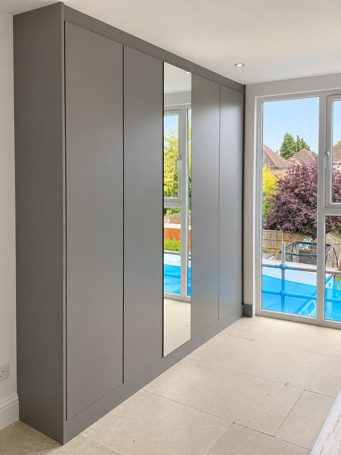 Further photograph of the completed Blyton loft wardrobes in Guildford