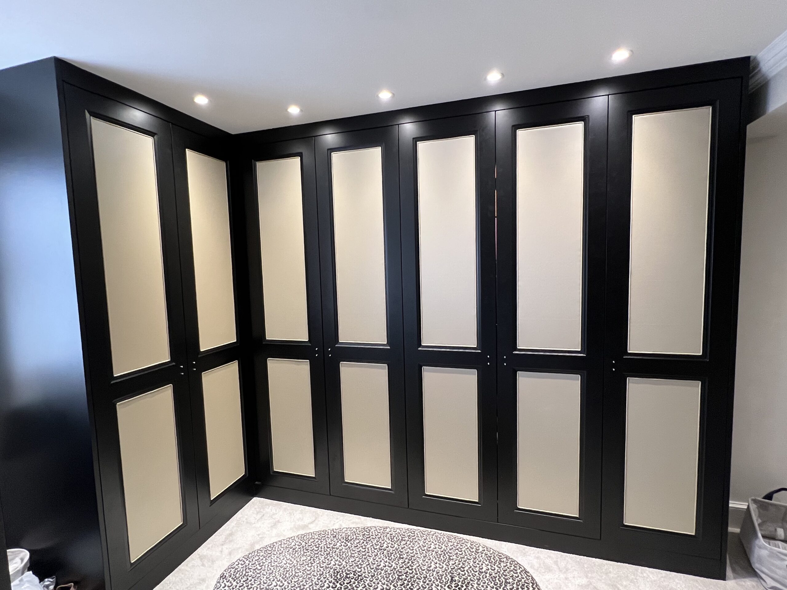 Goodwood bespoke fitted wardrobes with contrasting framed door design