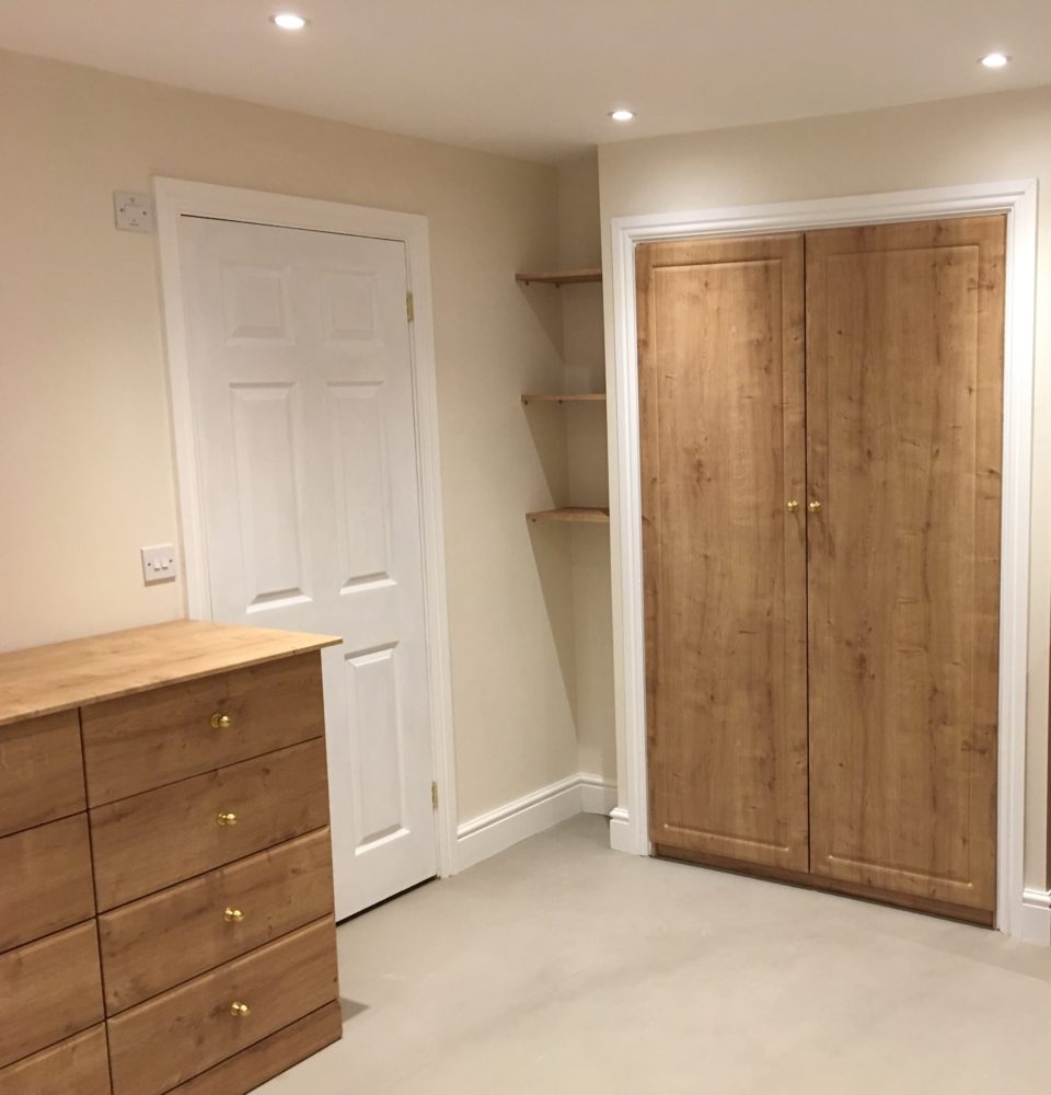 Simply Fitted Wardrobes - Oak fitted bedroom Essex.
